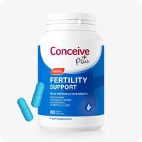 Conceive Plus Max Couples Fertility Bundle featuring Men’s Fertility Support bottle with blue label, shown alongside two turquoise vegan capsules, designed to support male reproductive health and sperm quality, displayed on a light background.